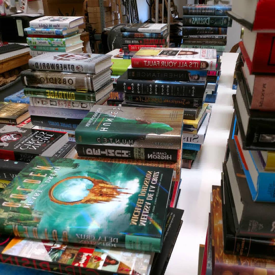 Table full of books being sorted